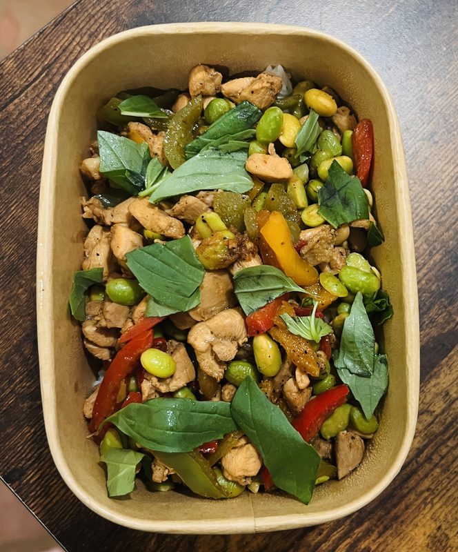 Chicken stir-fry with edamame, peppers, and fresh basil
